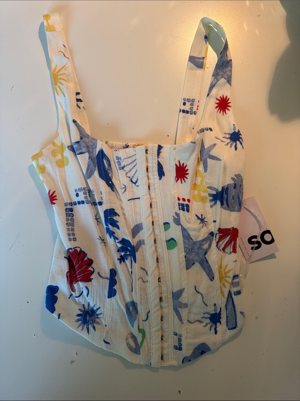 SO White Smocked Shell-Print Crop Top with Blue and Yellow Accents